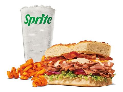 Arby's Three Cheese Beef and Bacon Stacker with curly fries and a drink