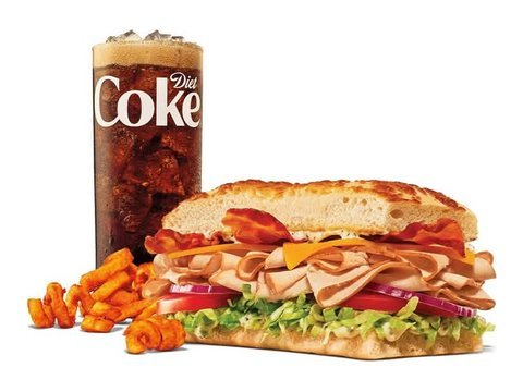Arby's Turkey Ranch and Bacon Stacker with curly fries and a drink