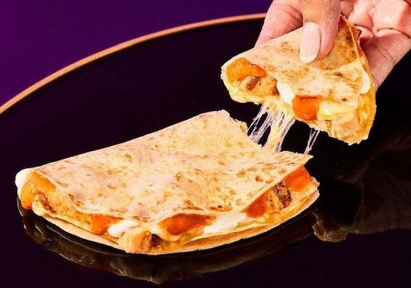 Taco Bell Chicken Crunchadilla with melted cheese and chicken